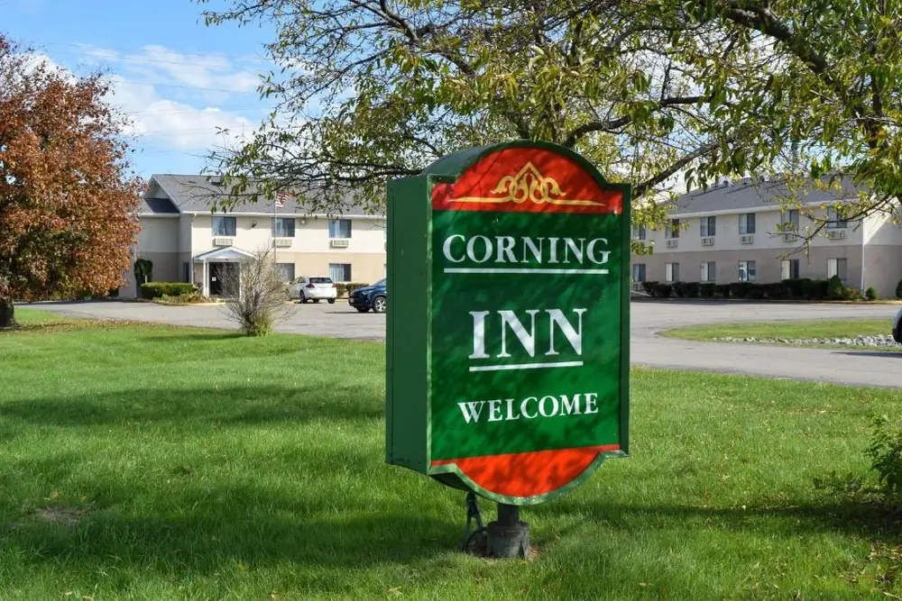 Corning Inn welcome sign in front of the hotel